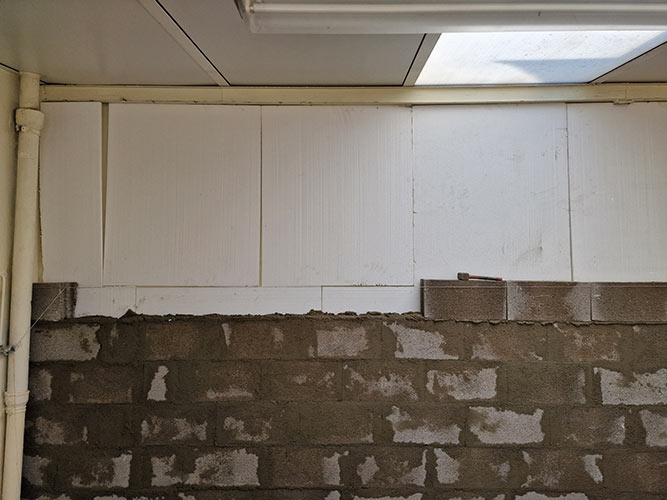 Création d'un mur d'agglo pour une séparation de limité de propriété chantier st nazaire.